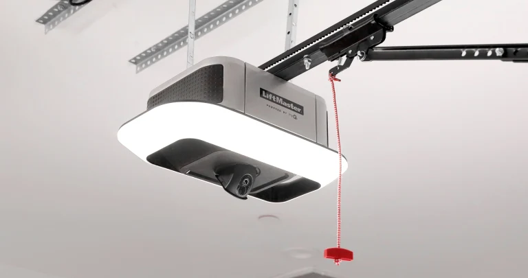 Ceiling-mounted LiftMaster garage door opener with its overhead rail and light.